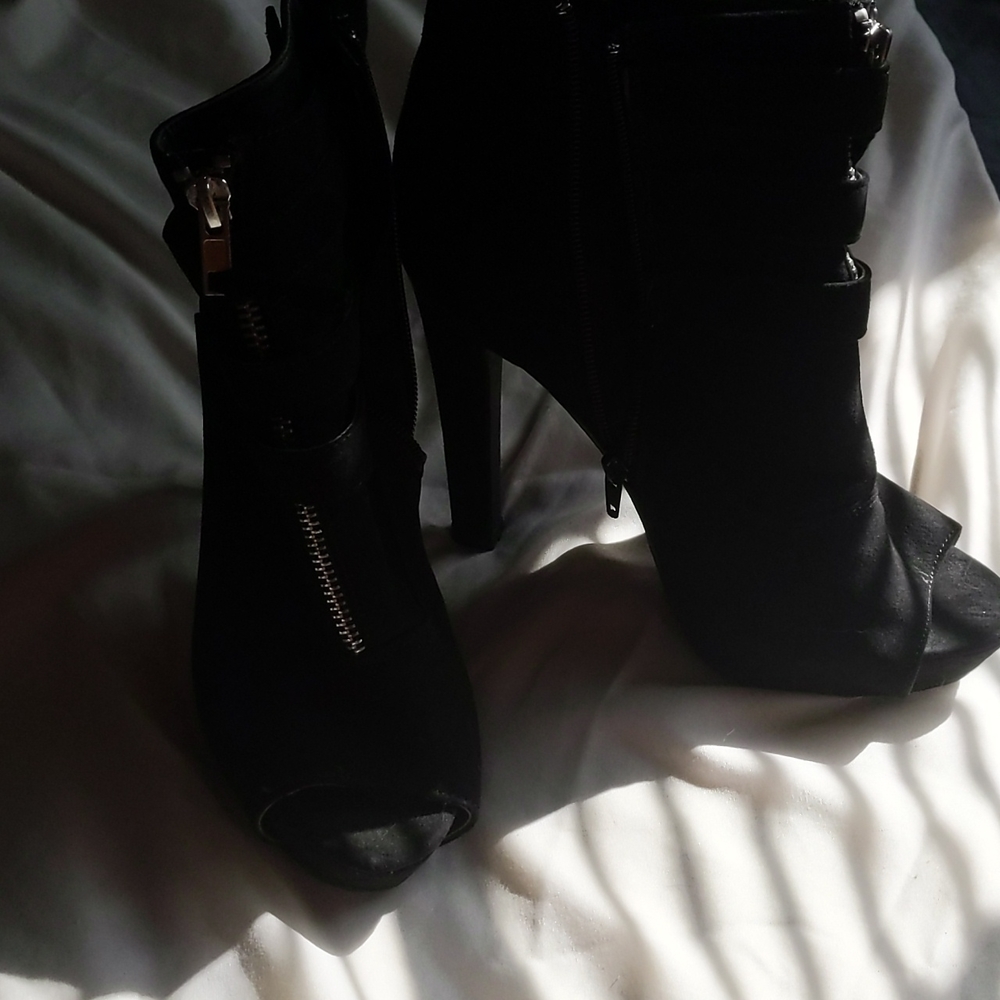 Black heeled open toed ankle boots